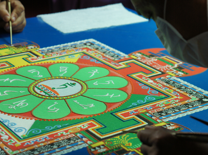 Compassion Tour 2014/15 - The Monks of Gaden Shartse Dokhang Khangston creating a sand mandala.